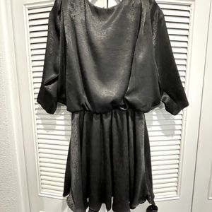 Satin draped minidress with shoulder pads and cinched waist